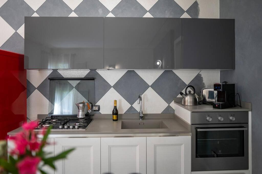 Montecolo Bay 1 Apartment Pilzone ภายนอก รูปภาพ