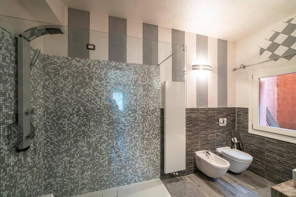 Montecolo Bay 1 Apartment Pilzone ภายนอก รูปภาพ